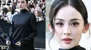 45岁董洁在巴黎喝咖啡被拍，身穿厚重羽绒服，面相变了不敢认！